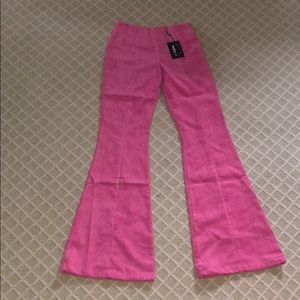 Pink cord flared trousers